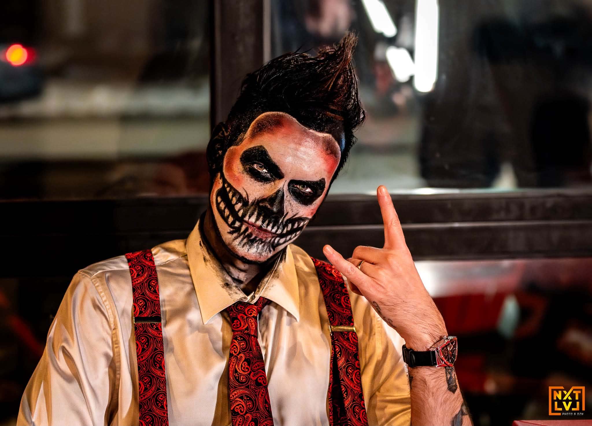 Brian Durst in skull makeup under dramatic light.